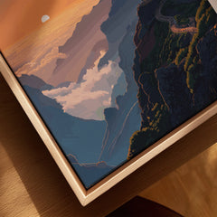 Closeup of framed canvas wall art with mountain landscape at sunset in natural wood floating frame