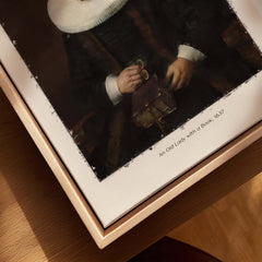 Rembrandt Old Lady with Book 1637 Portrait Print Dutch Golden Age Poster Art displayed on a wooden frame.