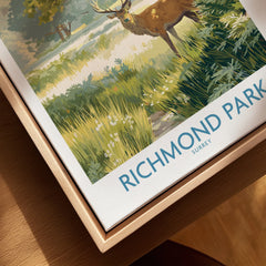 Framed Richmond Park Surrey travel poster with deer in a natural wood floating frame