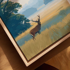 Closeup of framed canvas art featuring a stag in a scenic national park landscape.