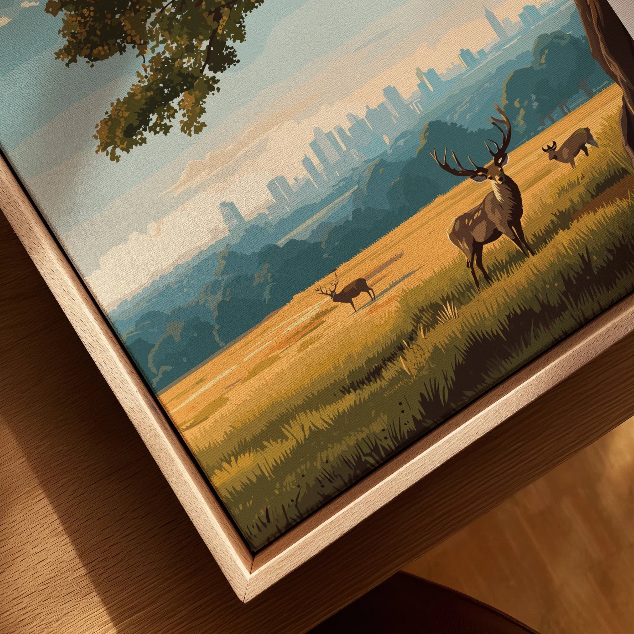 Close-up of canvas wall art with deer in grass, natural wood floating frame, city skyline backdrop