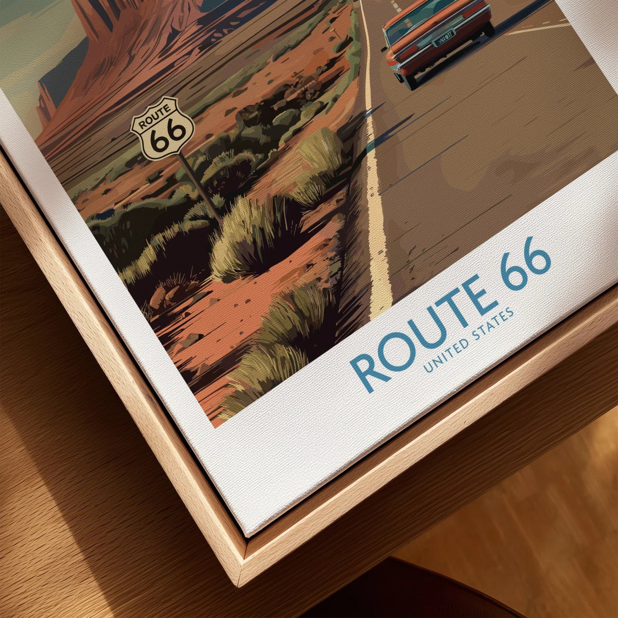 Close-up of Route 66 travel poster in natural wood floating frame, classic road art print