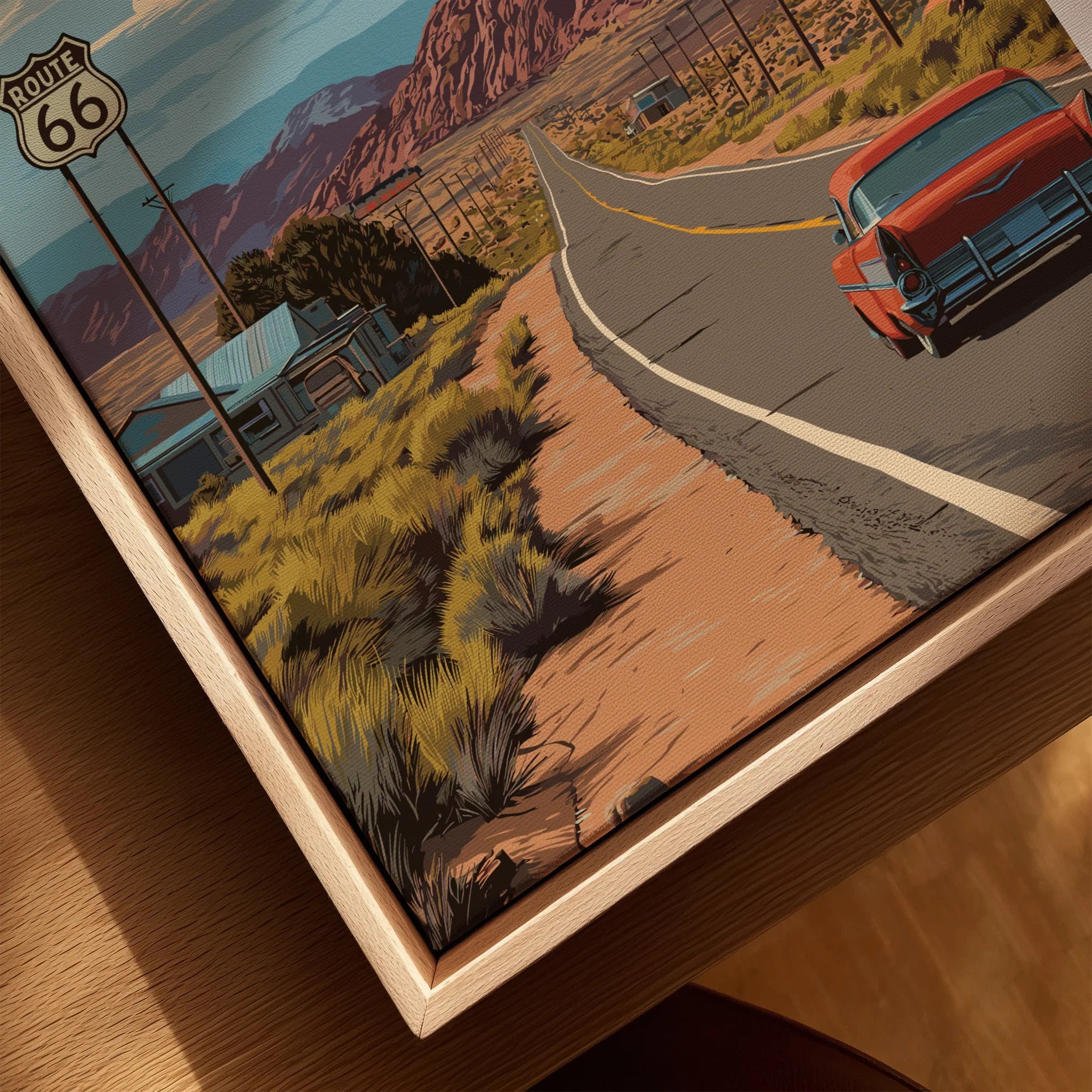 Closeup of Route 66 travel poster in a natural wood floating frame with vintage car art