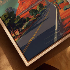 Close-up of framed canvas Route 66 travel art print with road and red rock landscape