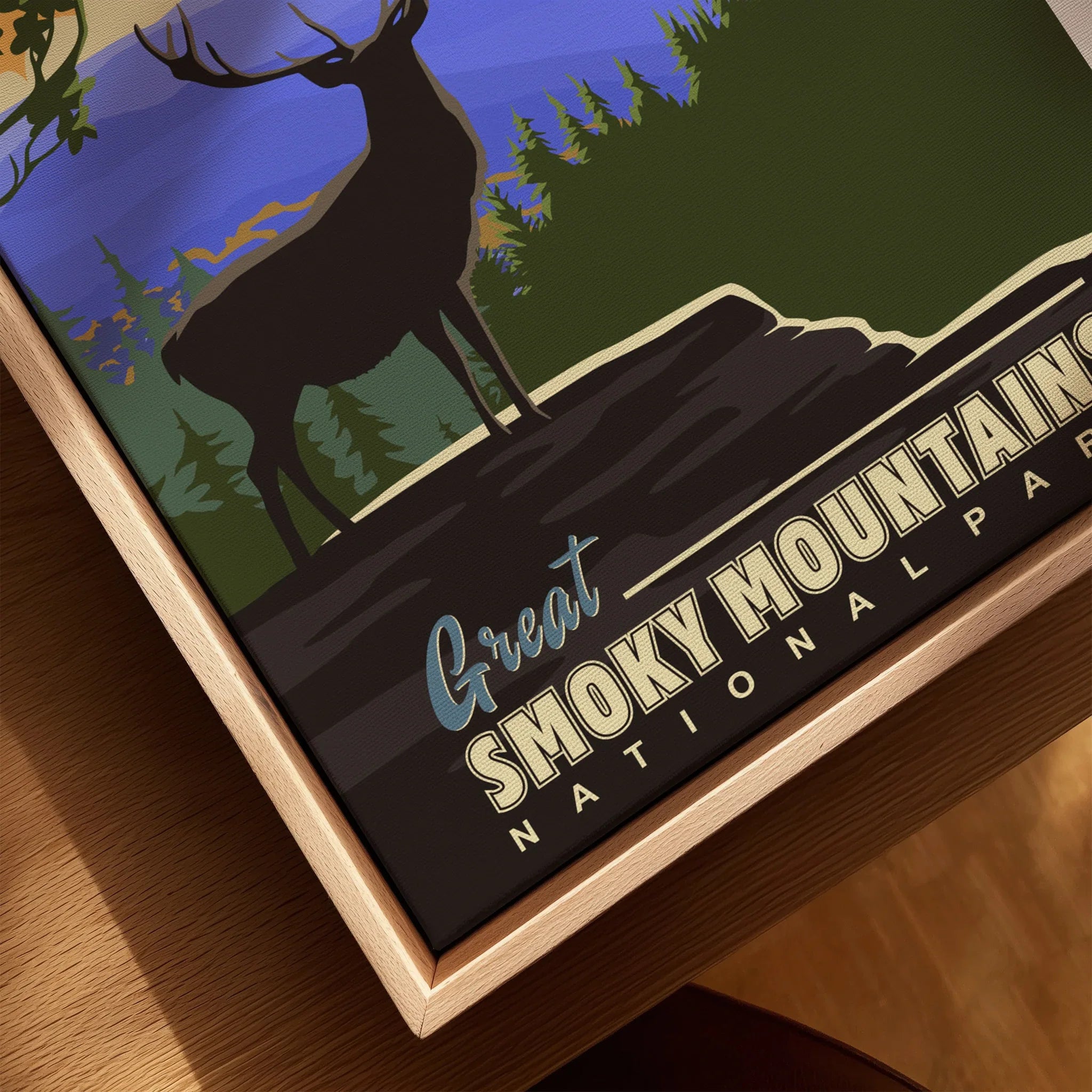 Closeup of a framed Great Smoky Mountains National Park canvas print with elk and forest art.