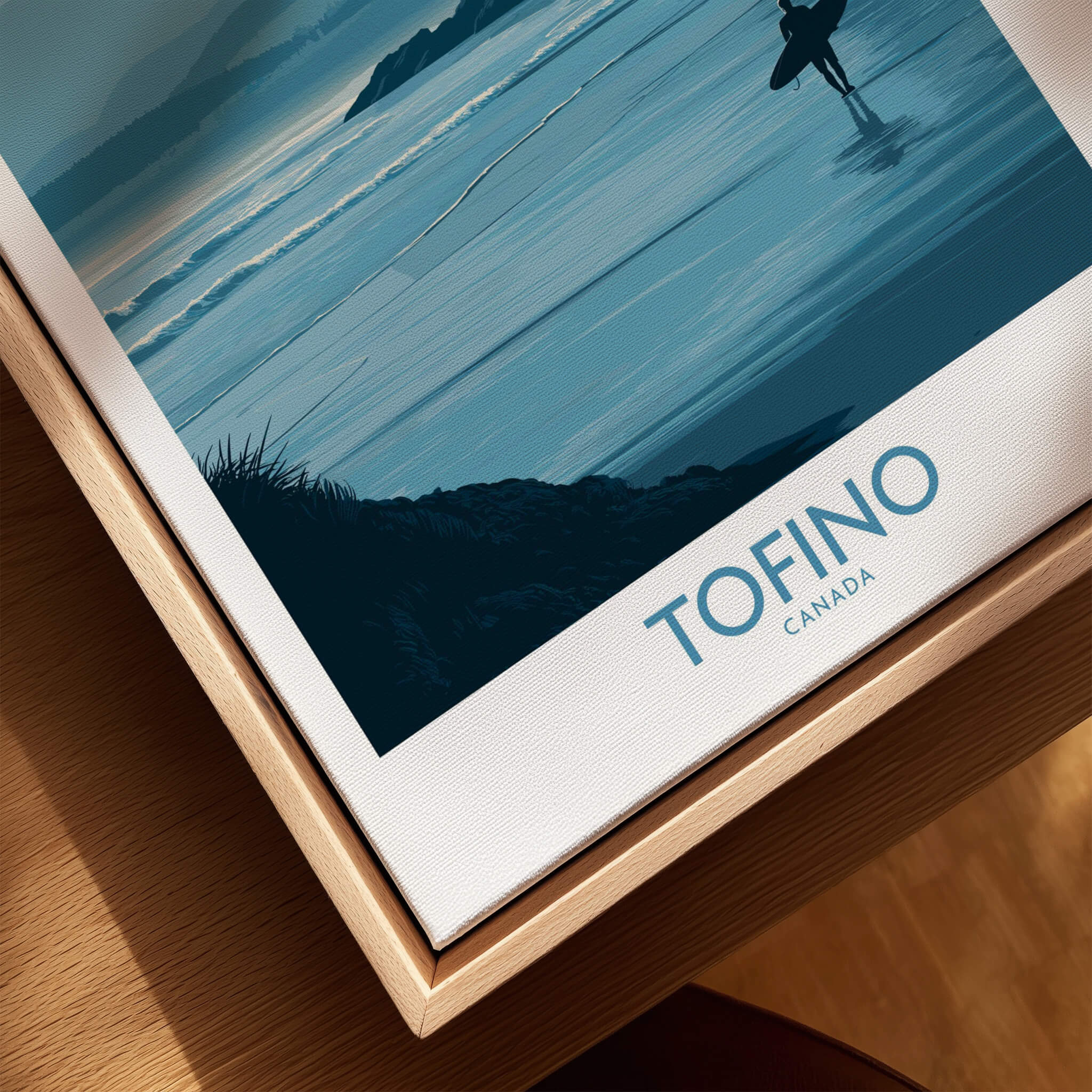 Tofino Canada Canvas Print | Misty Mountain & Shoreline Poster displayed on wooden frame.