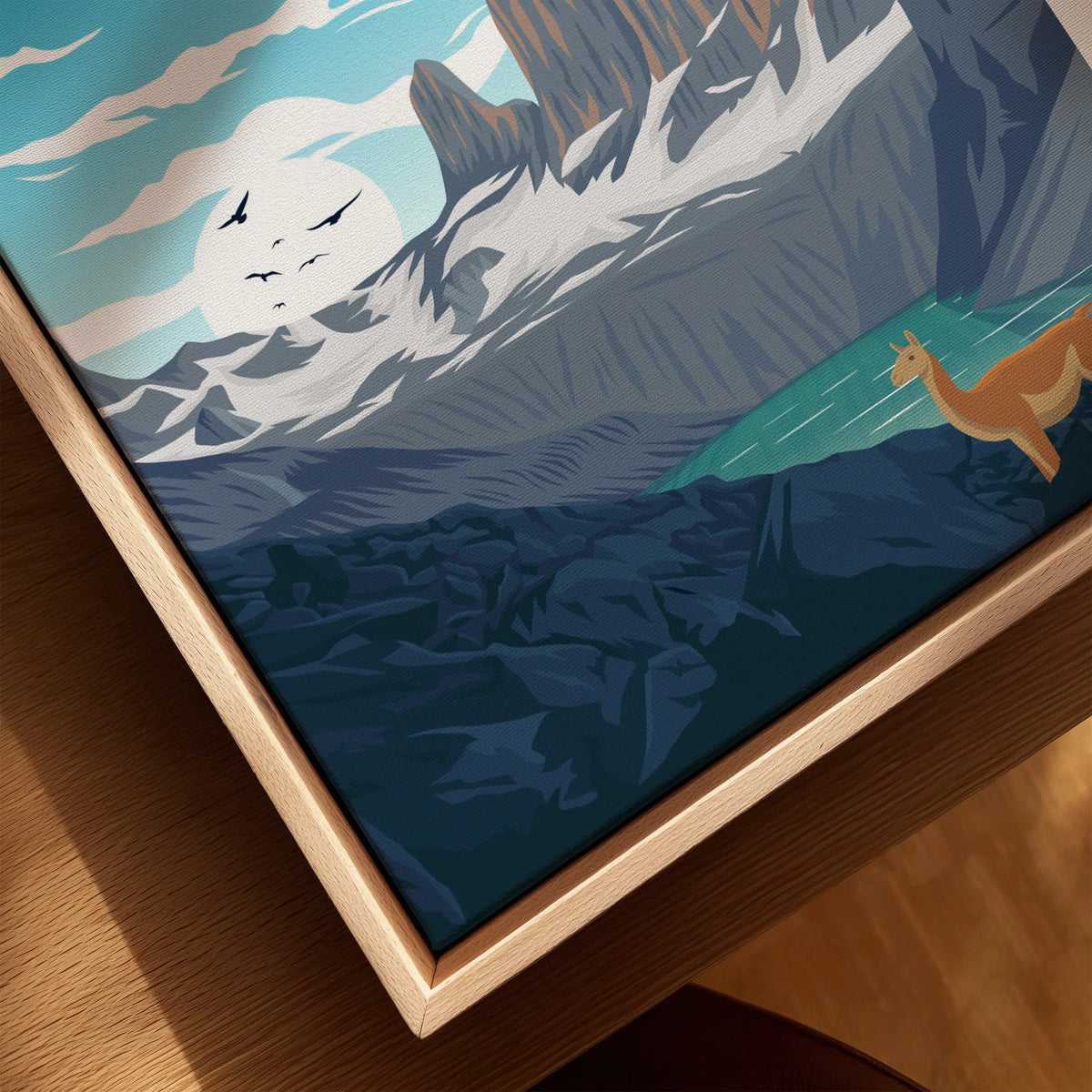 Closeup of framed Torres del Paine National Park print with mountains and llama artwork