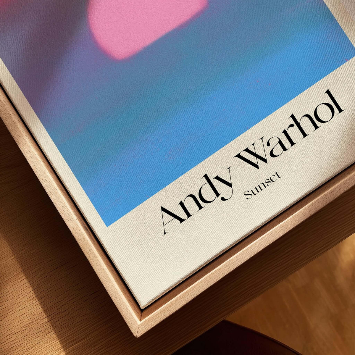 Andy Warhol Sunset Pink Blue Pop Art Poster Abstract Screenprint Wall Art Print displayed on a wooden frame.