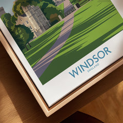 Close-up of Windsor England travel poster in natural wood floating frame, canvas texture visible