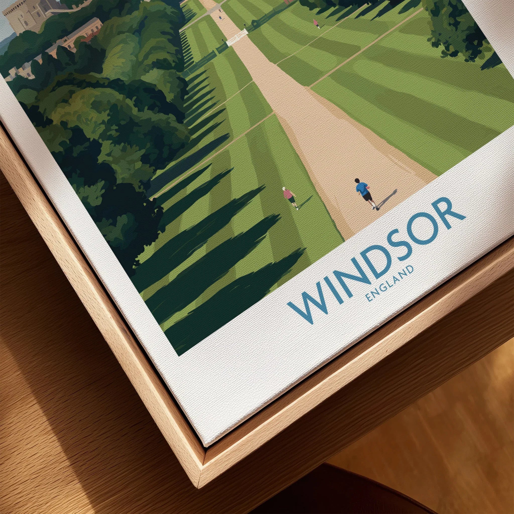 Close-up of framed Windsor England travel poster with natural wood floating frame