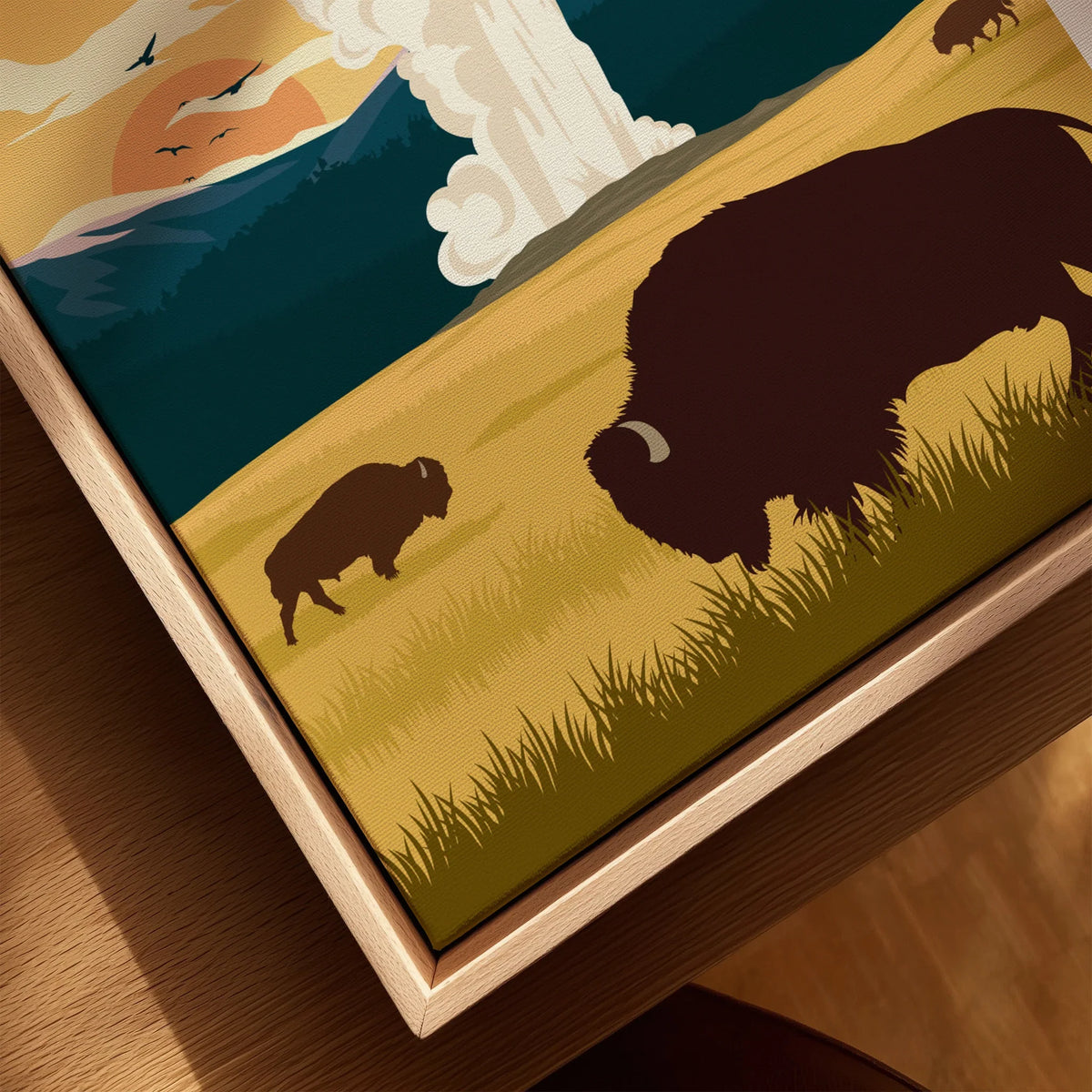 Framed Yellowstone National Park print with bison, geyser, sunset, and natural wood frame.