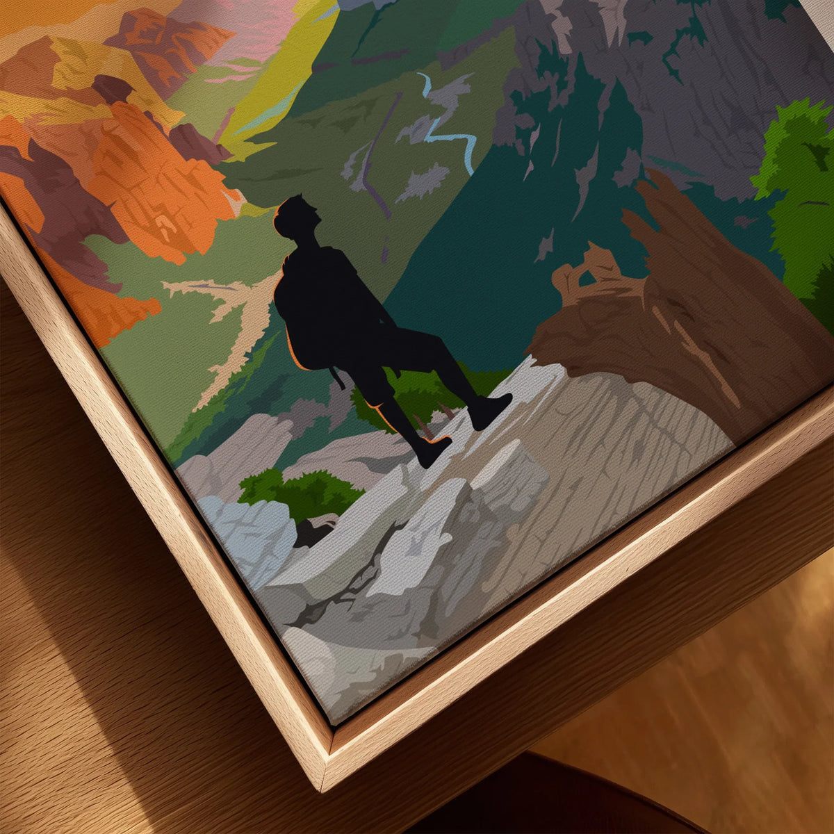 Close-up of framed canvas wall art featuring a hiker in Zion National Park landscape.