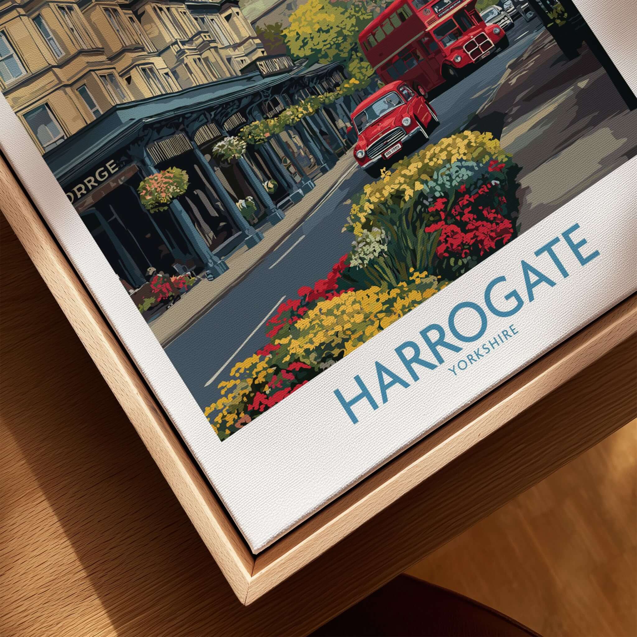 Harrogate Yorkshire Print | Floral Street Scene Poster featuring vibrant flowers and a classic red bus.