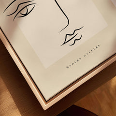 Picasso Minimalist Face Outline Line Art Simple Abstract Poster Modern Gallery Print displayed on beige background.