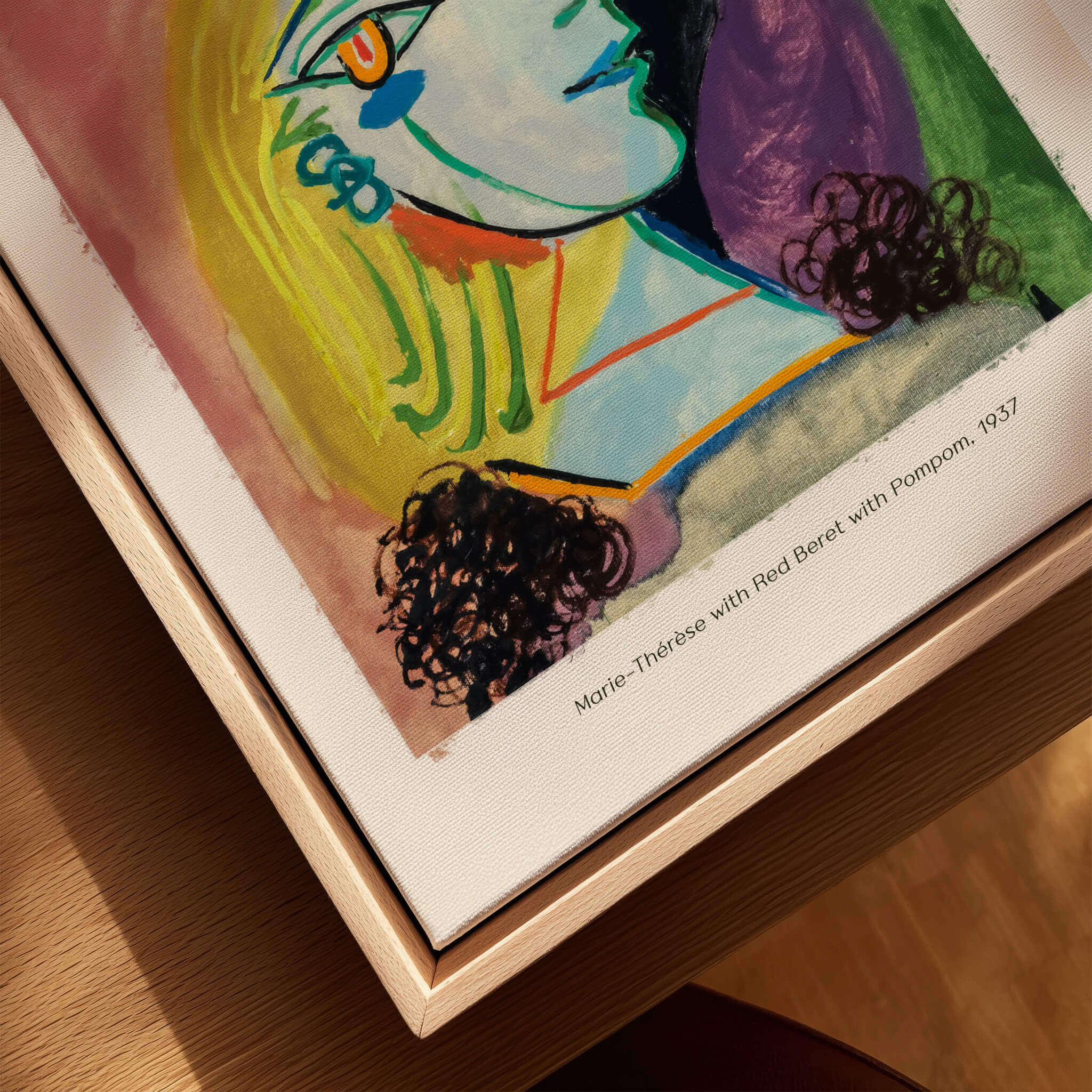 Picasso Marie Thérèse Red Beret Pompom 1937 Portrait Art Print Cubist Poster Colorful displayed in a wooden frame.