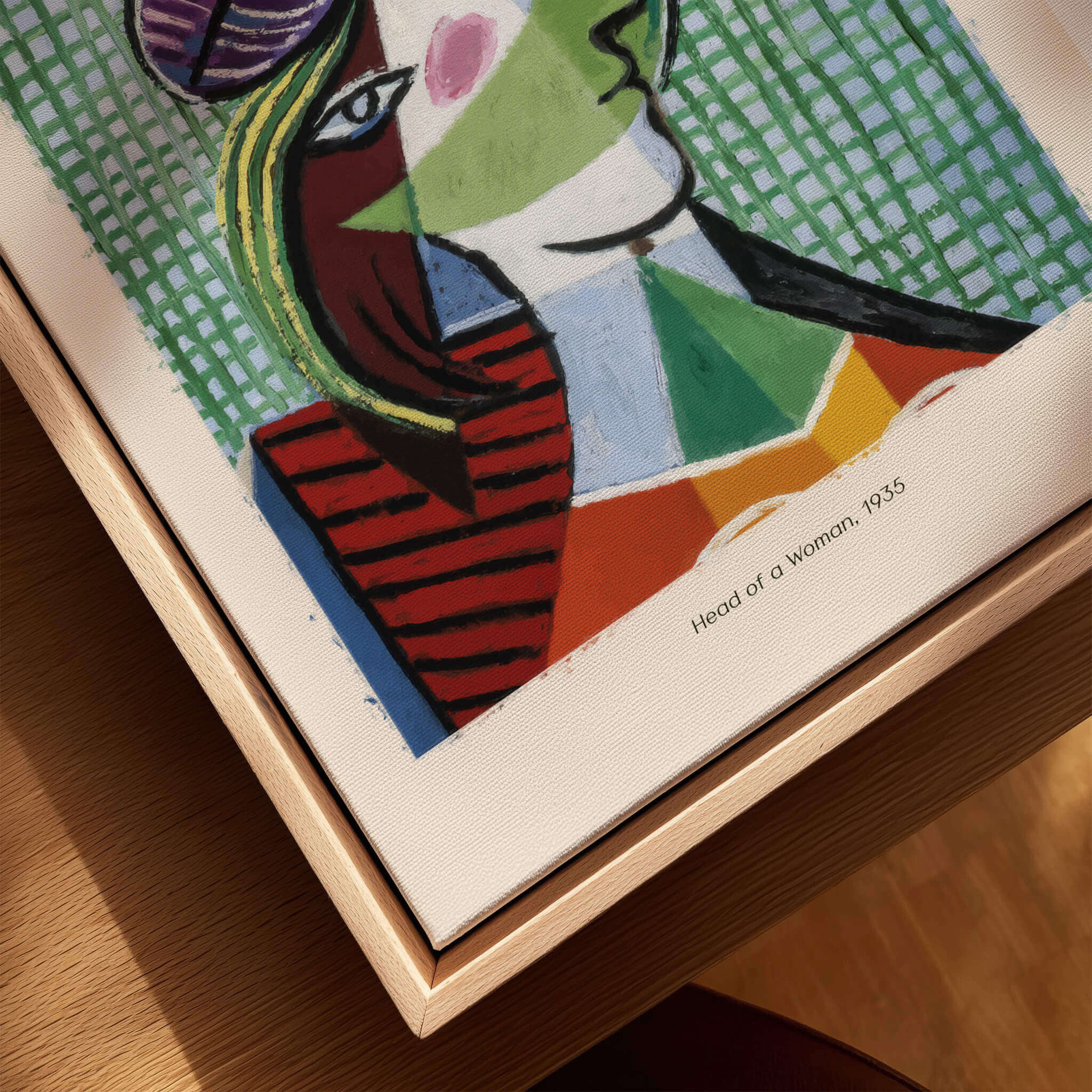 Picasso Head of a Woman 1935 Art Print Cubist Portrait Poster Colorful Wall Art displayed in a frame.