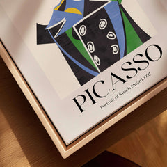 Picasso Portrait Nusch Eluard 1937 Colorful Cubist Art Print Modern Poster Wall Art displayed on a wooden table.