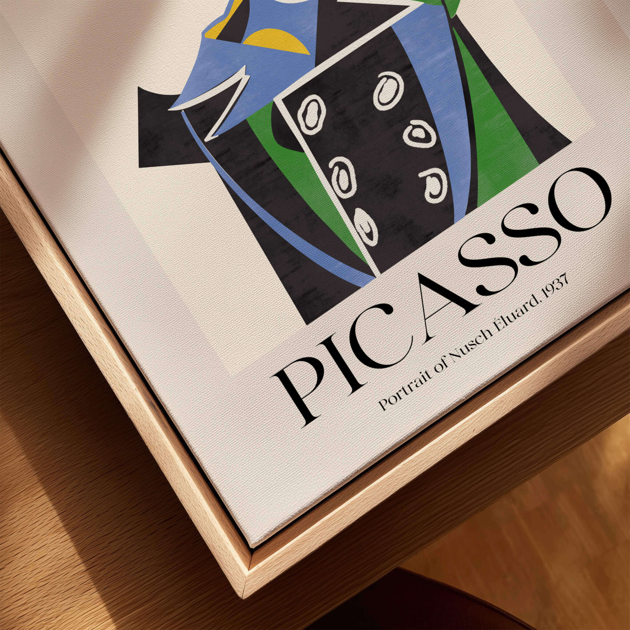 Picasso Portrait Nusch Eluard 1937 Colorful Cubist Art Print Modern Poster Wall Art displayed on a wooden table.