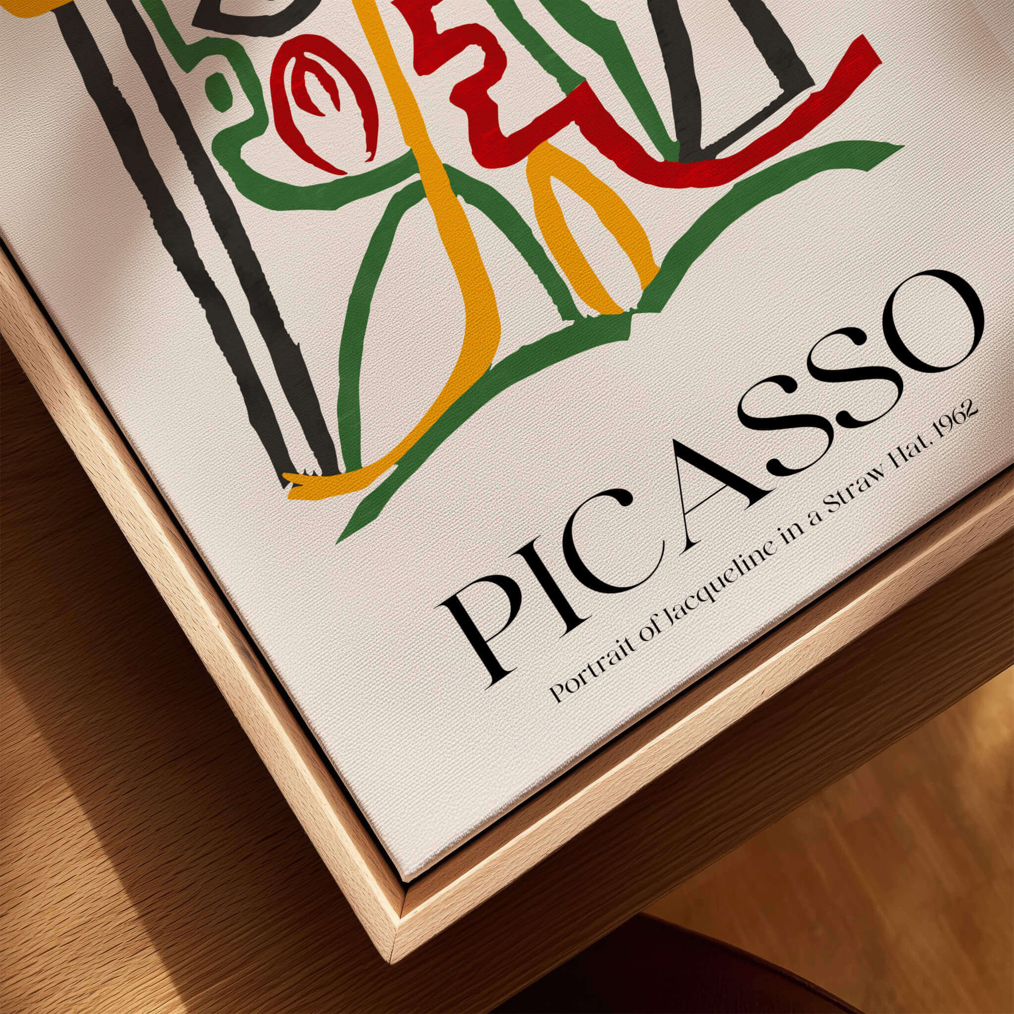 Picasso Portrait Jacqueline Straw Hat 1962 Abstract Line Art Print Colorful Poster on a wooden surface.