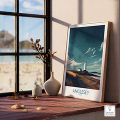 Anglesey Wales Seascape Beach Path Poster - North Wales Travel Decor displayed on a wooden table beside a window.