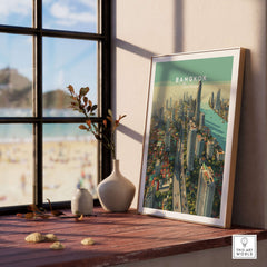 Bangkok Thailand City Skyline Poster - High-Rise Urban Landscape Print displayed on a window sill with beach view.