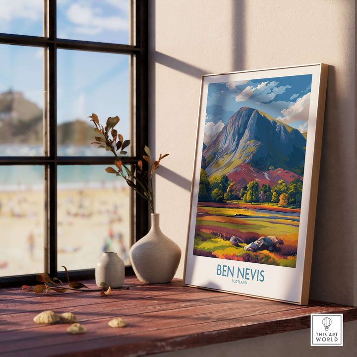 Ben Nevis wall art showcasing vibrant autumn foliage in a Highland landscape, framed on a wooden table.