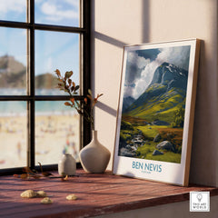Ben Nevis Scotland Wall Art Hillside Panorama - Nature Travel Decor displayed on a wooden table near a window.