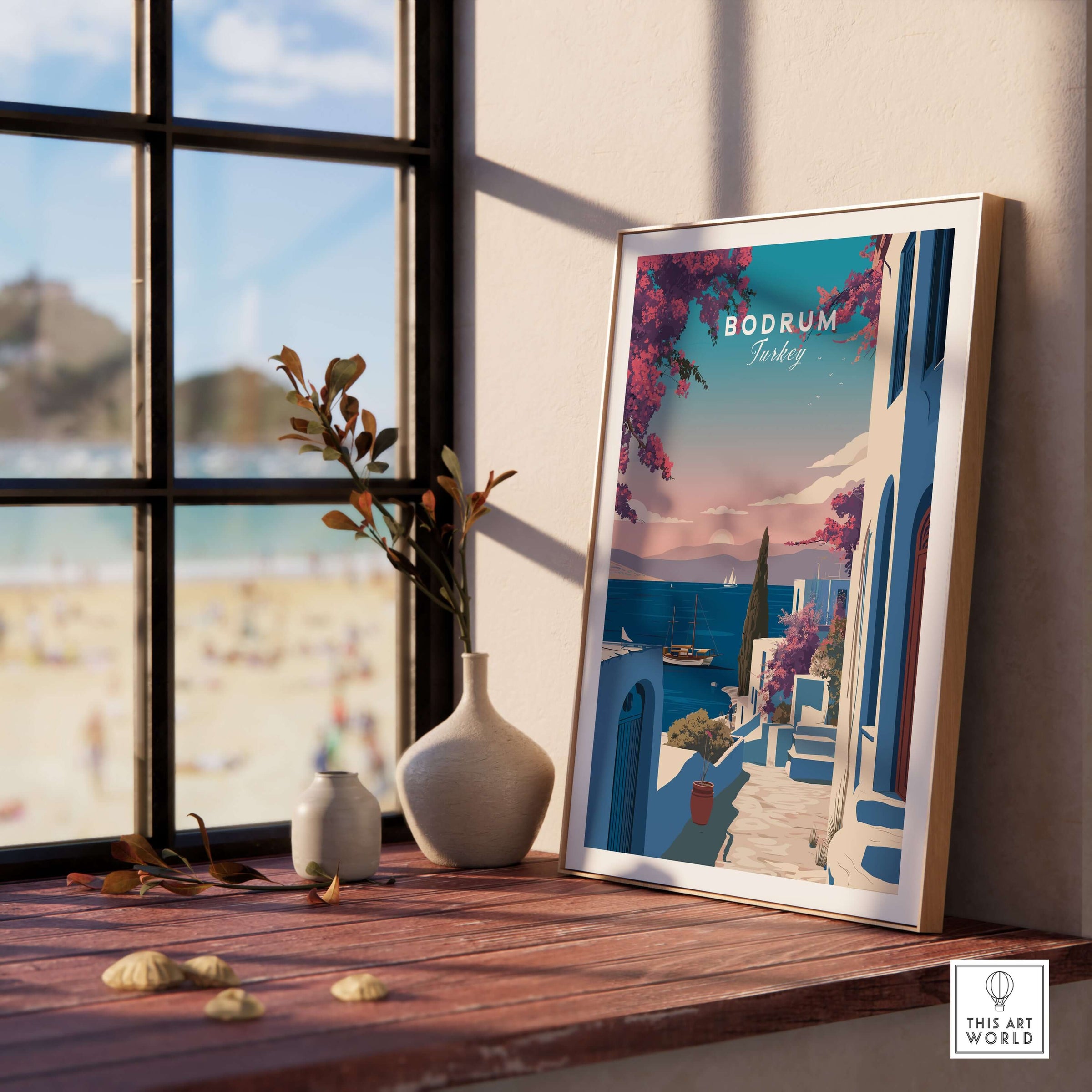 Bodrum Turkey Travel Poster - Aegean Sea Wall Art displayed on a wooden table by a window with beach view.