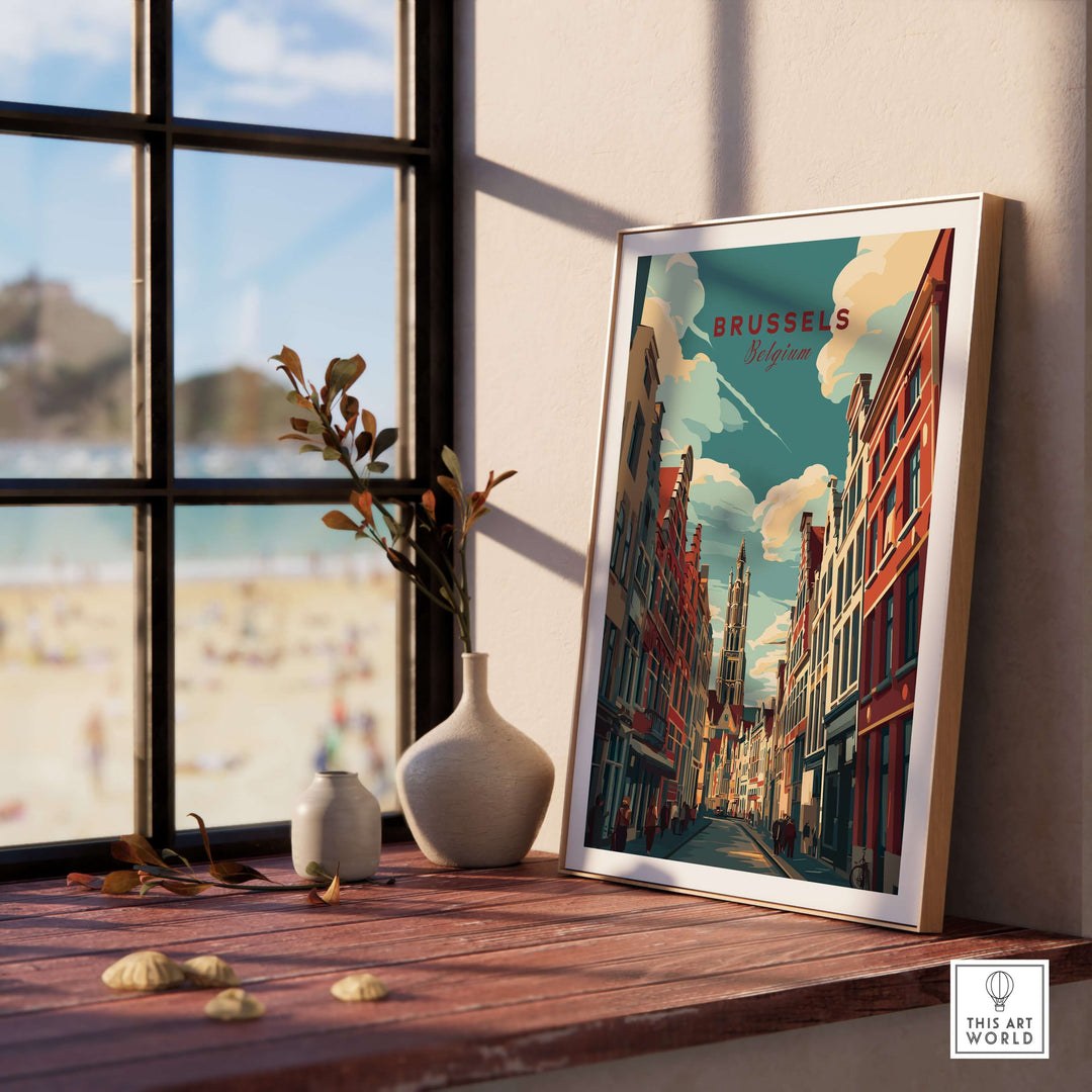 Framed poster of Brussels street art featuring iconic buildings by a window, adding urban charm to interior decor.
