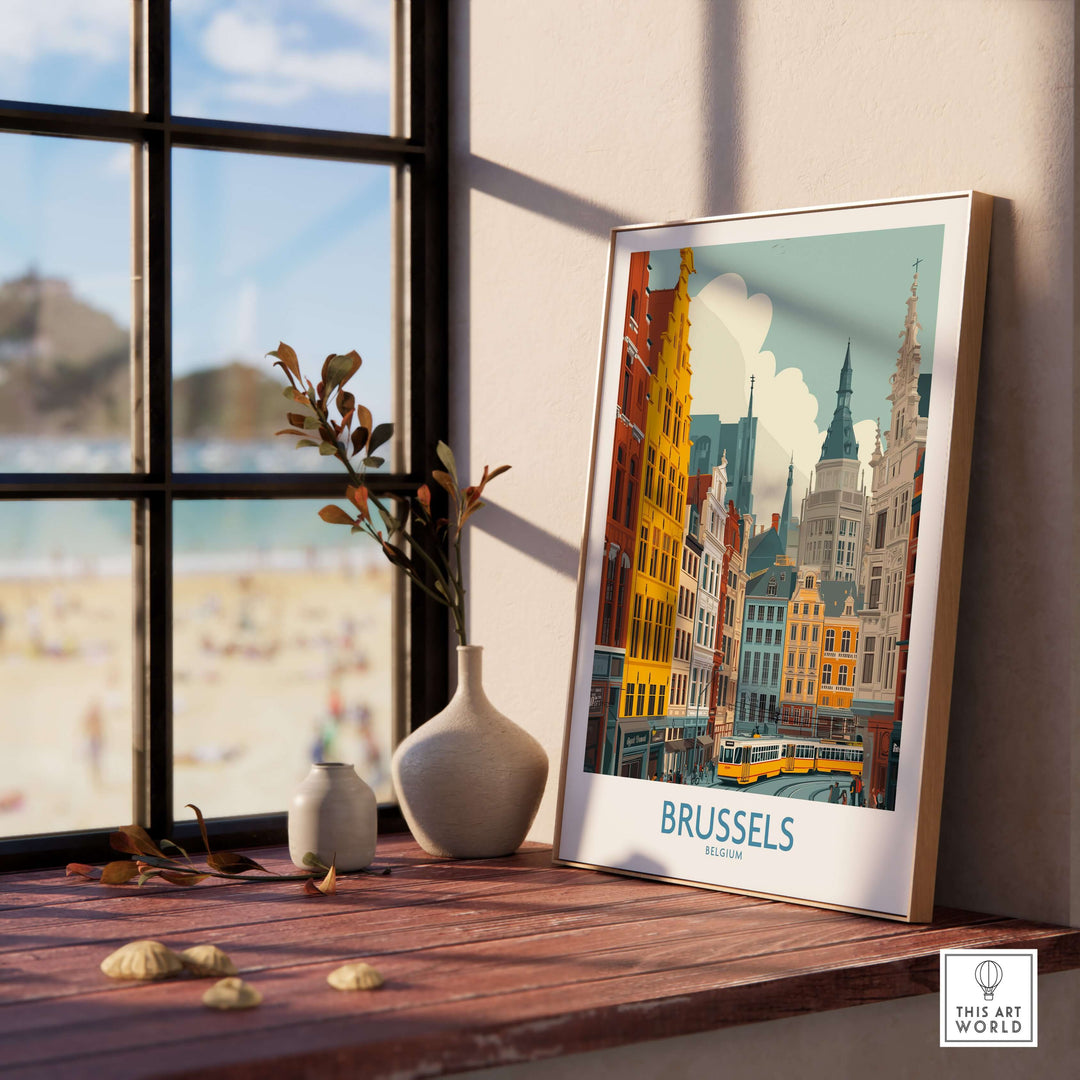 Brussels wall art print showcasing Belgium's historic buildings, displayed on a sunlit shelf beside a vase.