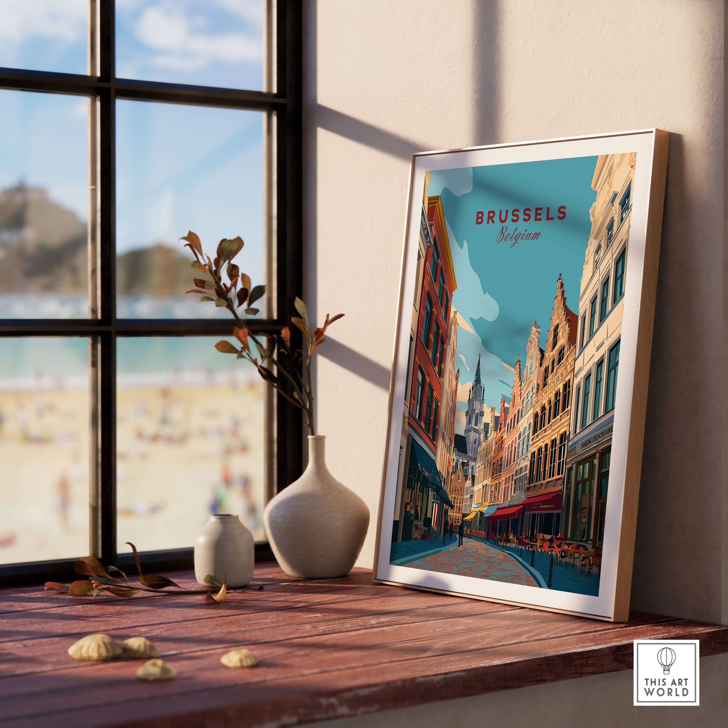 Brussels Print Belgium - Old Town Europe Poster framed on a wooden table by the window, showcasing charming architecture.