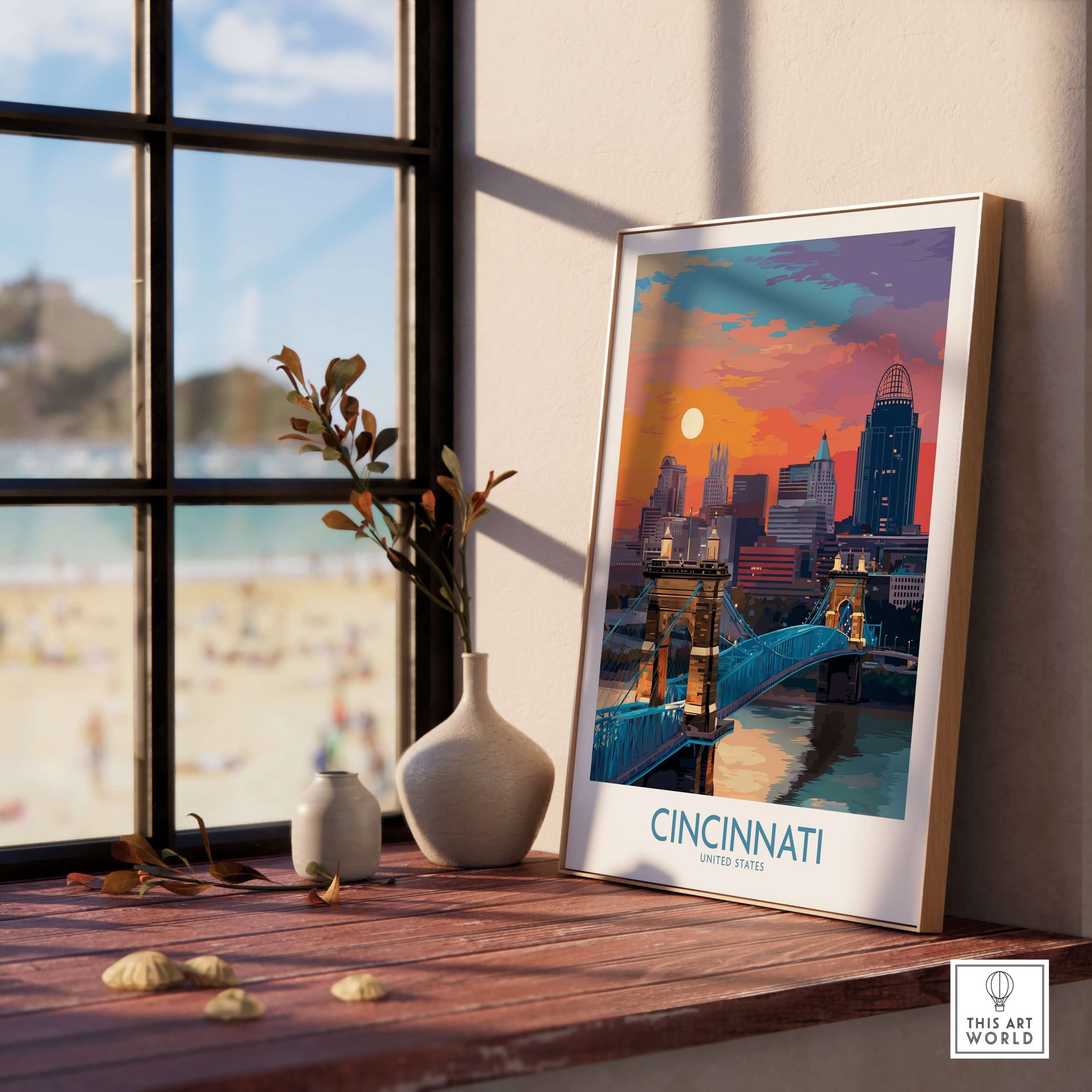 Cincinnati Ohio Downtown Cityscape Print - Ohio Travel Decor displayed on a wooden table by a window with a beach view.