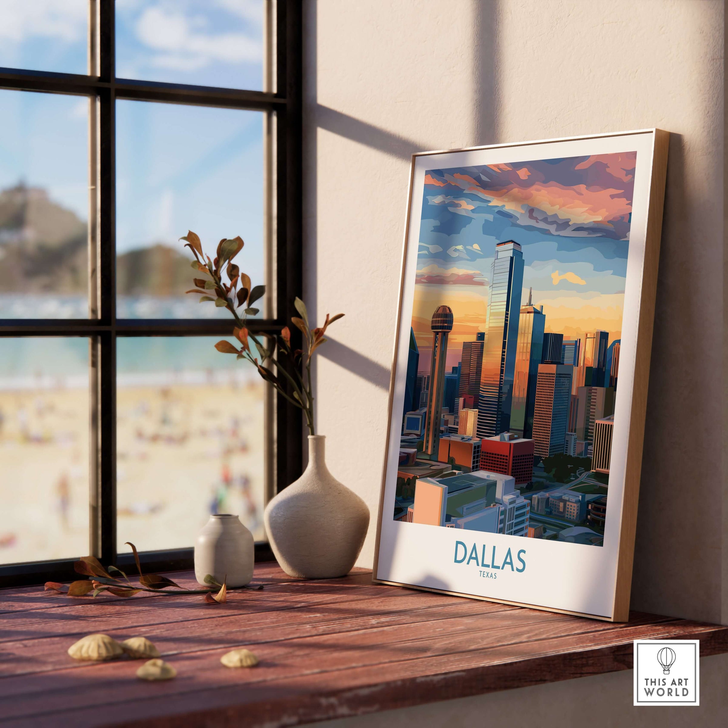 Dallas Texas Sunset Wall Art - Modern City Travel Decor displayed on a wooden table by a window.