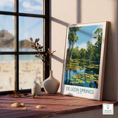De Leon Springs Florida Green Lily Pond Poster - Florida State Park Decor displayed on a wooden table by a sunny window.