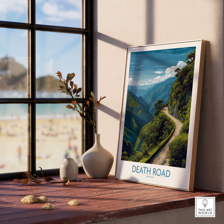 Death Road Bolivia Art Print | Yungas Road Poster displayed on a wooden table with a scenic background.