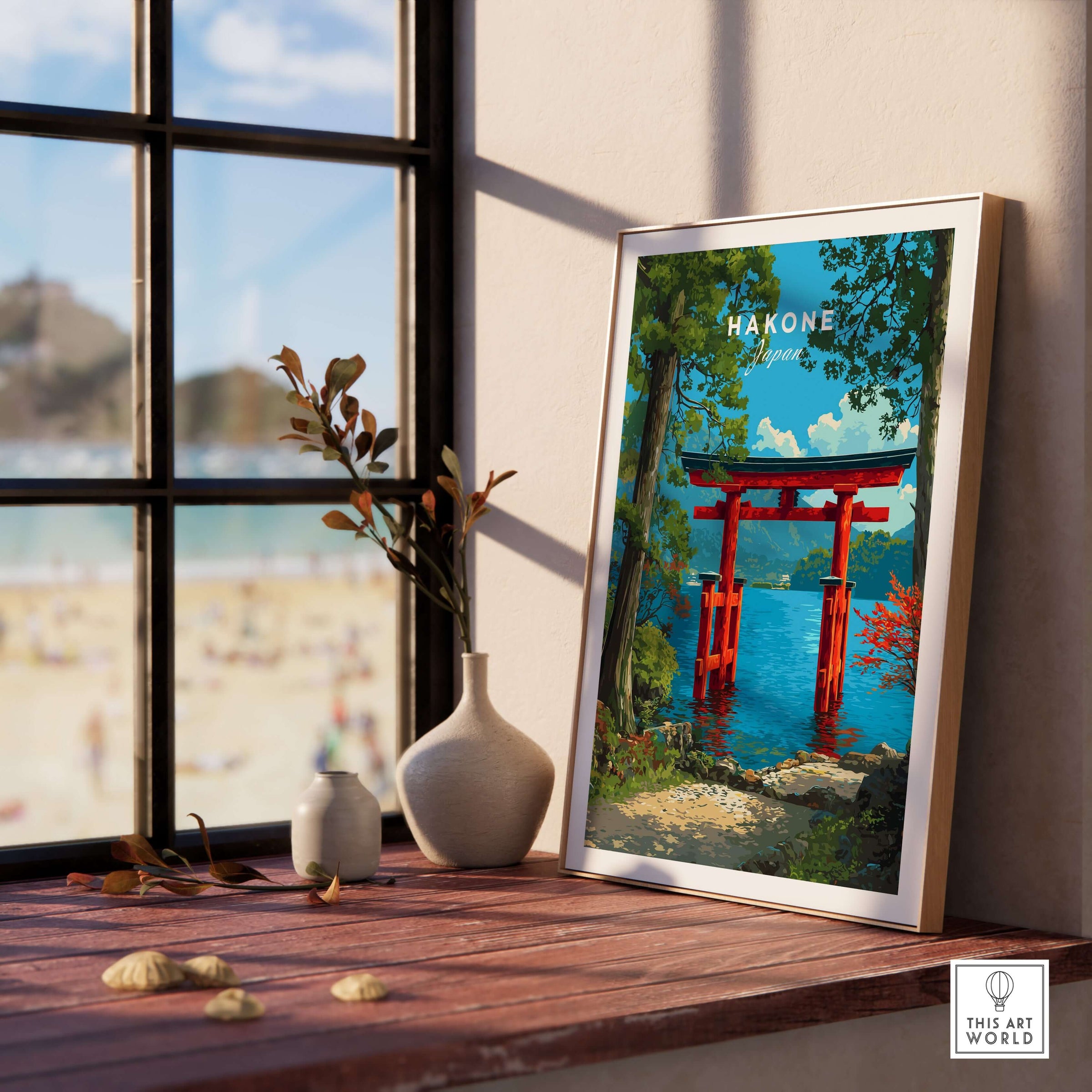 Hakone Japan Lake Ashi Torii Gate Poster - Floating Gate Wall Art displayed on a table near a window with beach view.