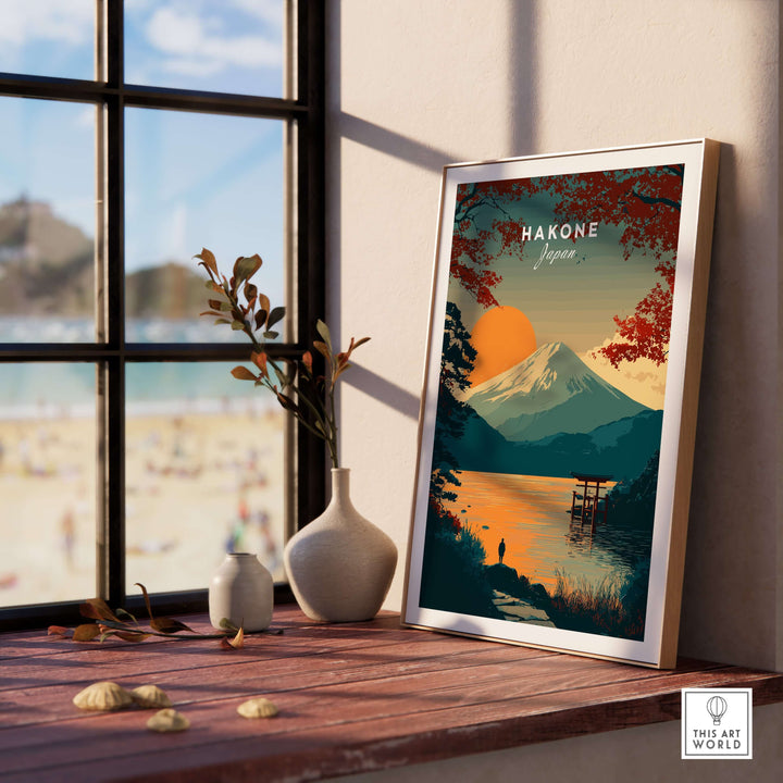 Hakone Japan sunset poster featuring Mount Fuji and vibrant lake view, framed decor in a serene indoor setting.