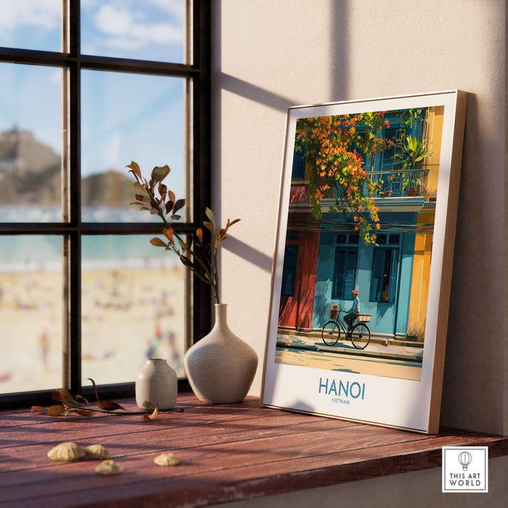 Hanoi wall art poster displayed on a wooden table, featuring vibrant colors and cultural elements of Vietnam.