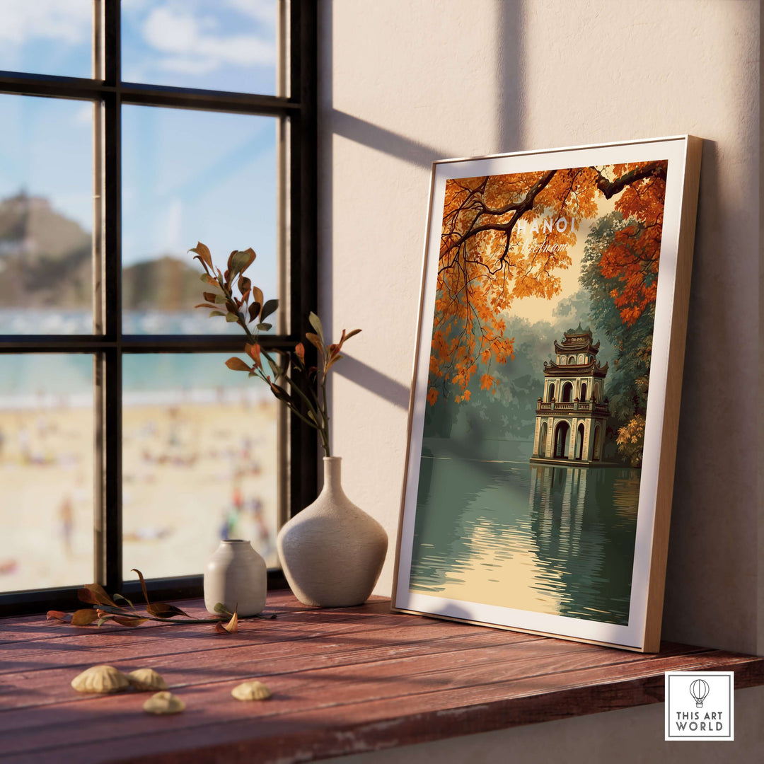 Hanoi Vietnam poster featuring Hoan Kiem Lake temple with autumn foliage in a serene indoor setting.