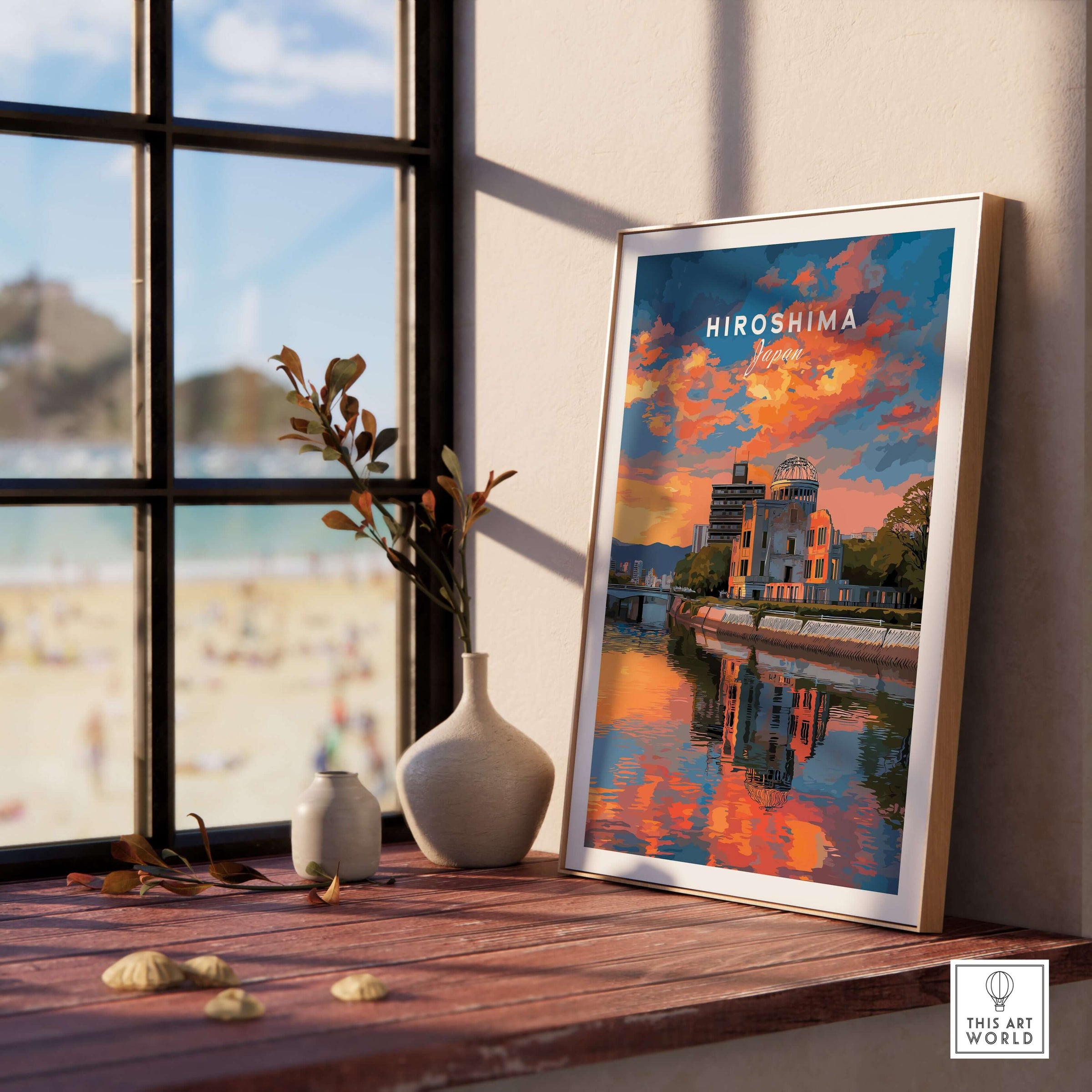Hiroshima Japan Sunset Poster - Vibrant Sky Wall Art displayed on a wooden table with a beautiful view.
