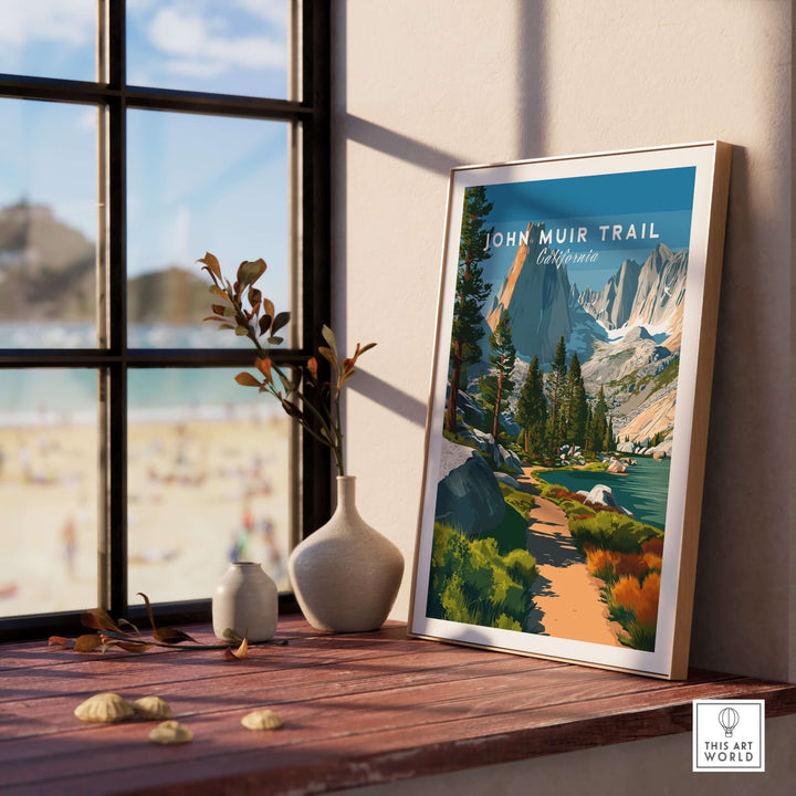 John Muir Trail California Lakeside Mountain Trail poster displayed indoors, featuring serene wilderness landscape and majestic mountains.