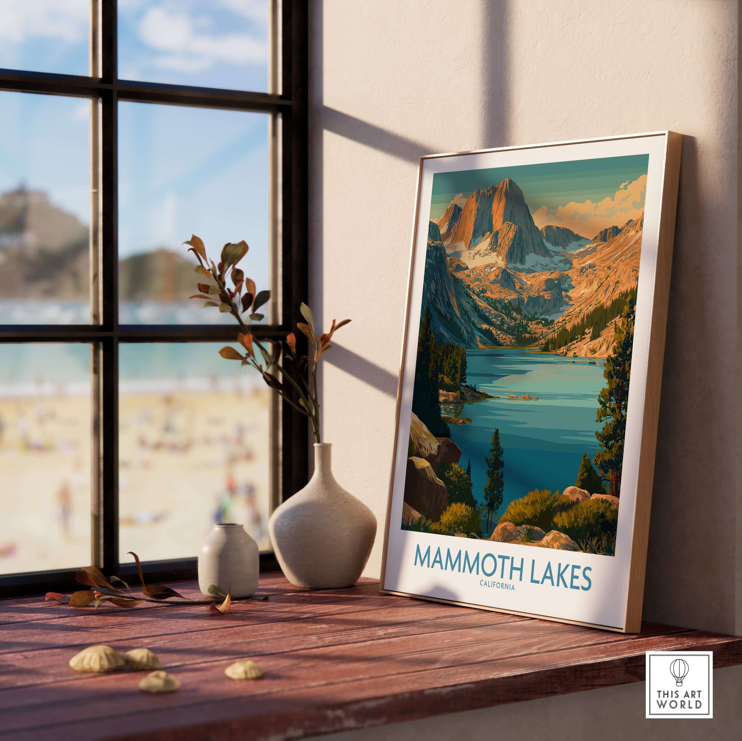 Mammoth Lakes Print California - California Wilderness Poster displayed on a table by a window with a beach view.