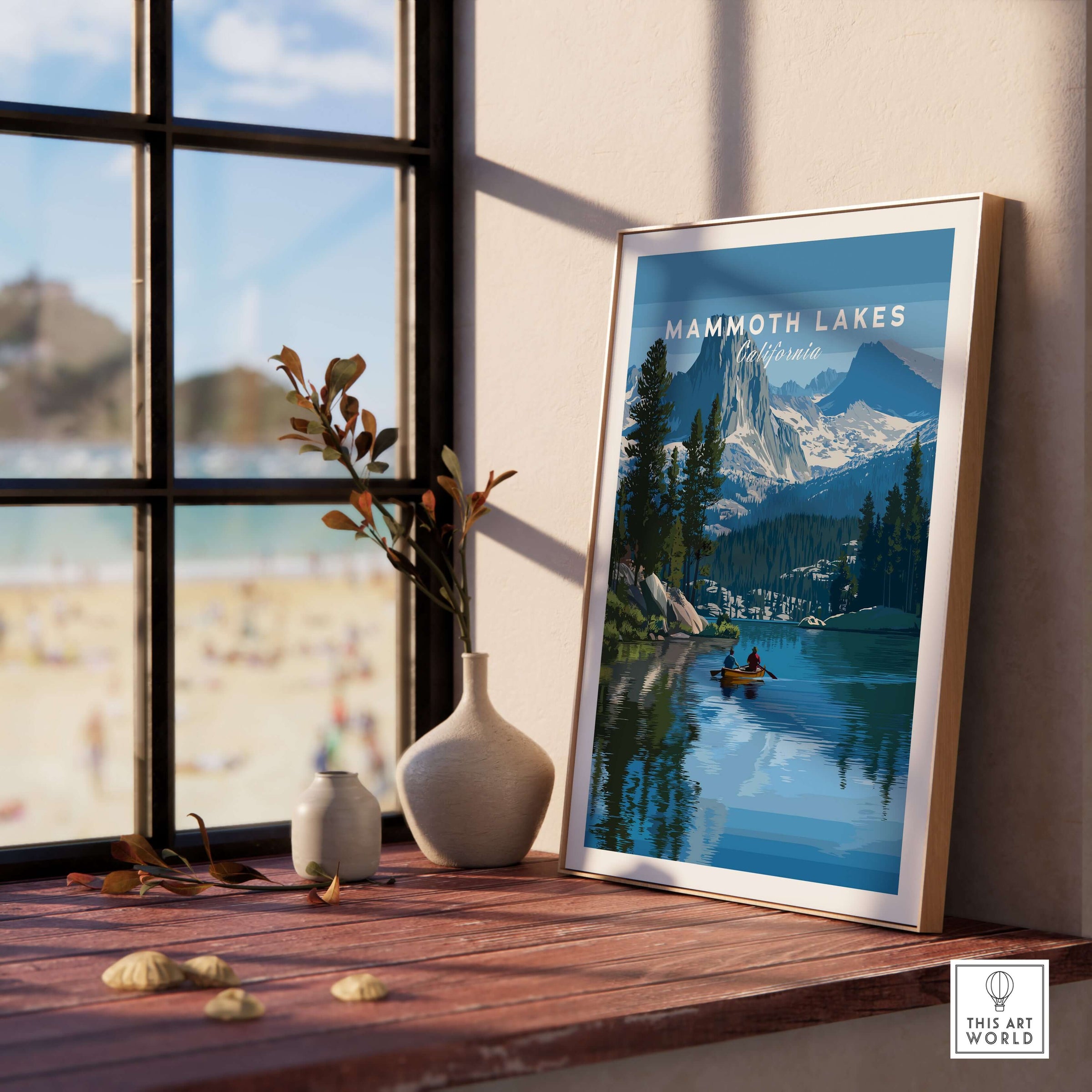 Mammoth Lakes - Mountain Adventure Wall Art displayed by a window, showcasing beautiful mountain and lake scenery.