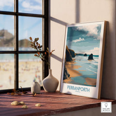 Perranporth Cornwall Ocean Walk Wall Art - UK Seaside Decor displayed on a wooden table with a beach view.