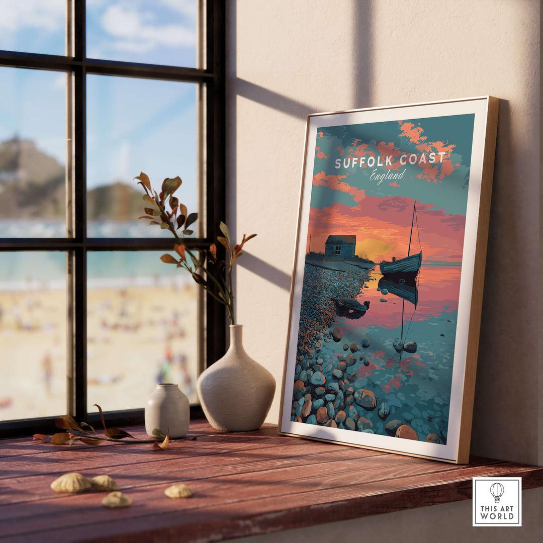 Suffolk Coast print showcasing a sunset over a pebble beach with a boat and coastal huts, perfect for coastal decor.
