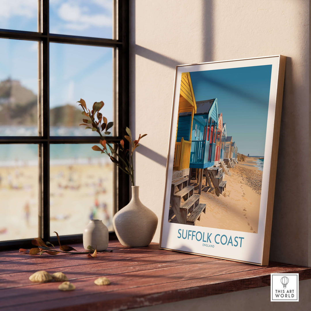 Suffolk Coast beach wall art in a stylish setting, showcasing colorful beach huts and sandy shorelines.