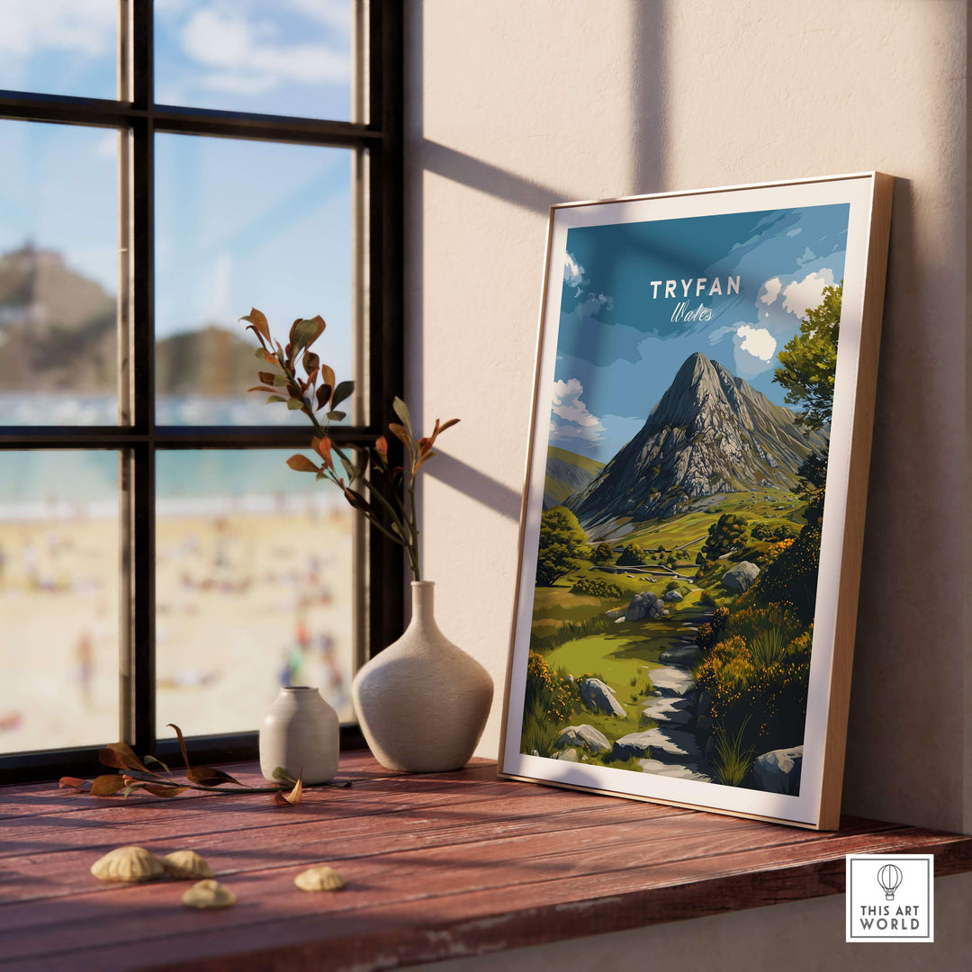 Tryfan poster featuring rugged Welsh Highlands mountains, displayed in a sunny room by a window.
