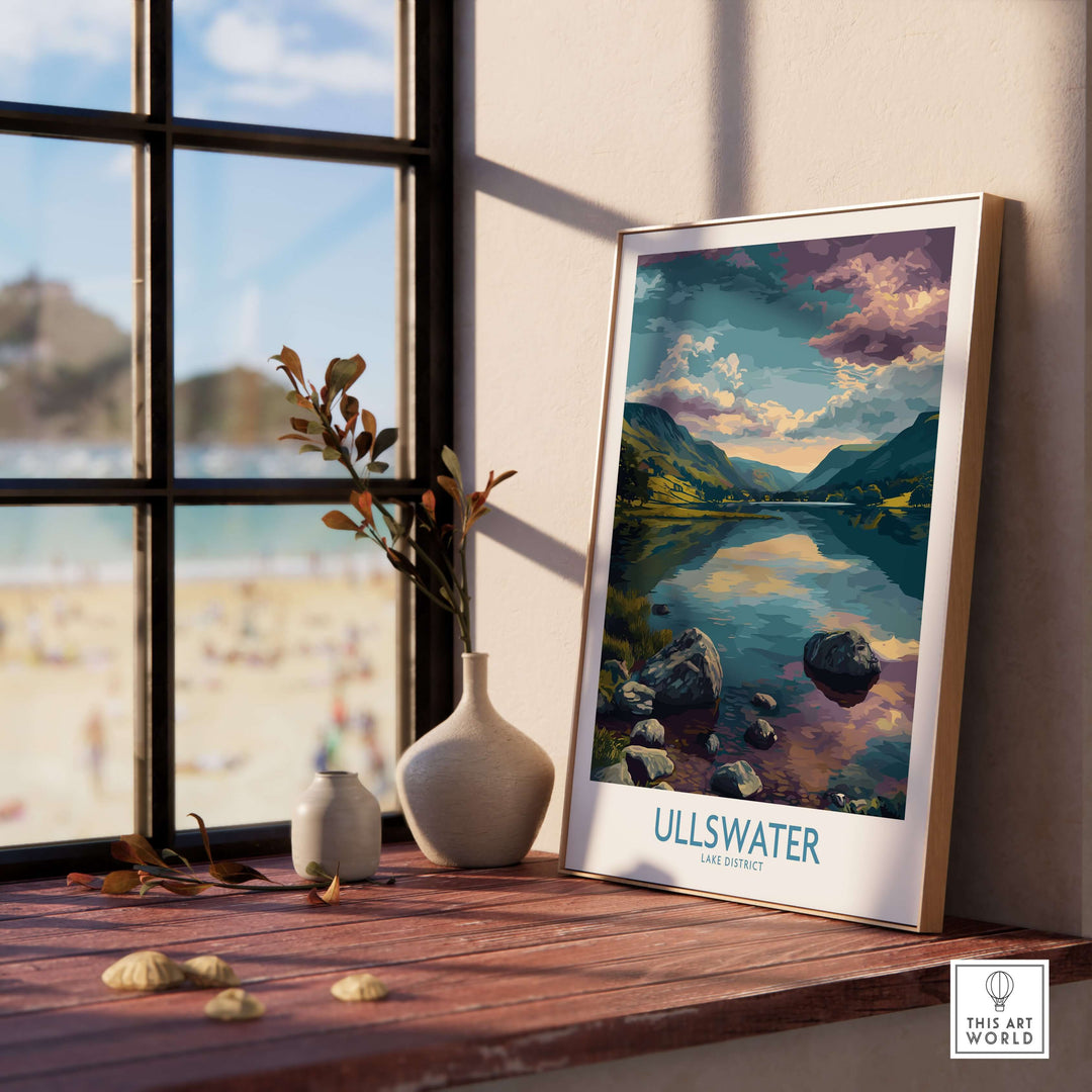Ullswater Lake District poster displayed on a windowsill with serene reflections and scenic nature view.