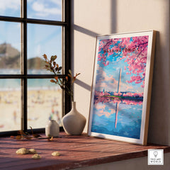 Washington D.C. Cherry Blossom Poster - Jefferson Memorial Print displayed on a table with a view of the beach.