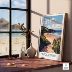 Woolacombe Devon Dunes to Ocean Poster - English Seaside Decor displayed by a beach view window in a cozy interior.